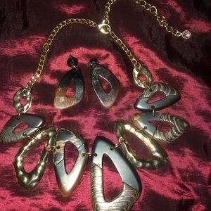 Matching necklace and earrings.